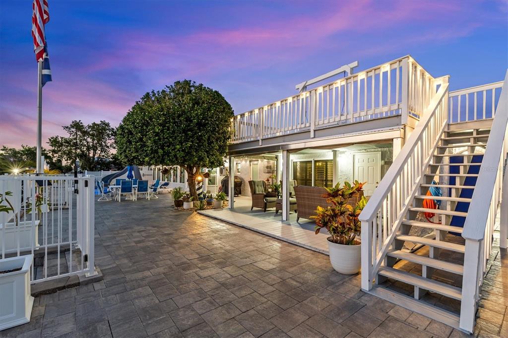 4387 6th Isle Drive Hernando Beach, FL 34607 - Photo 91 of 98 a view of a house with backyard and sitting area