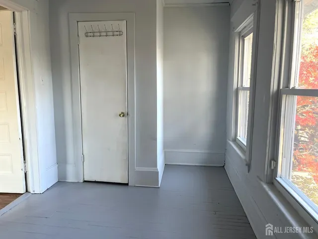 an empty room with windows