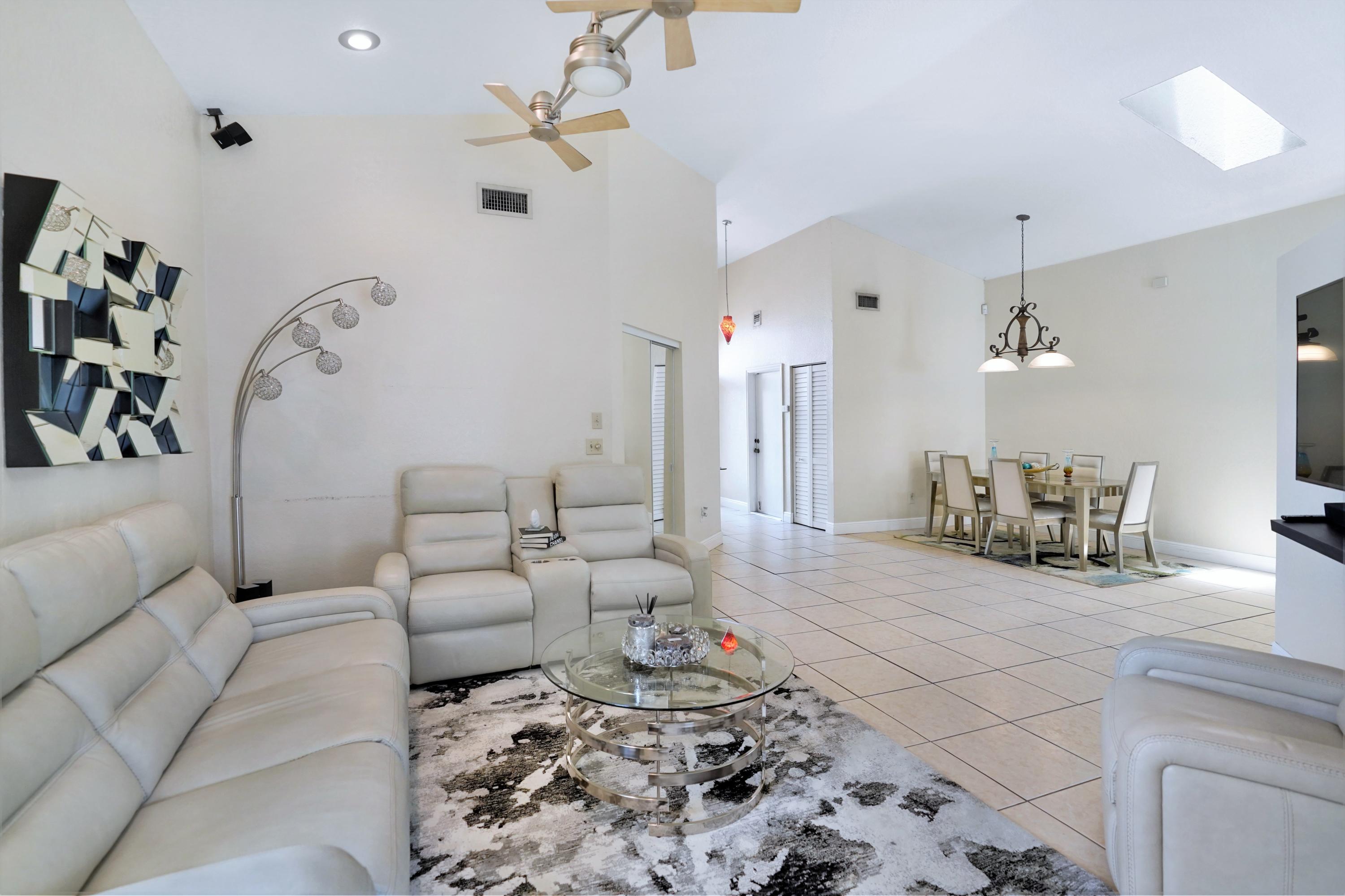 14001 Oak Ridge Drive Davie, FL 33325 - Photo 13 of 41 a living room with furniture and wooden floor