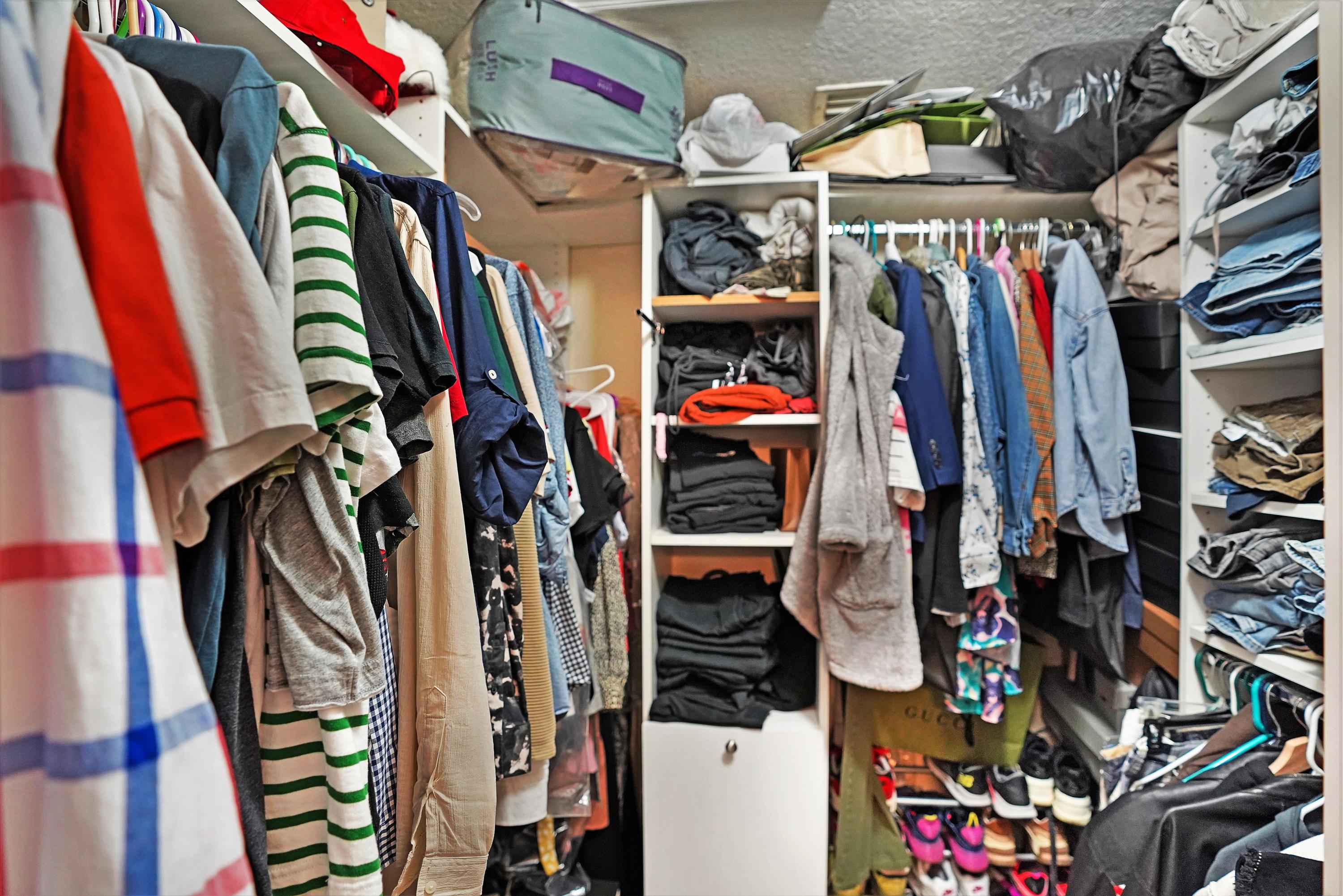 14001 Oak Ridge Drive Davie, FL 33325 - Photo 23 of 41 a view of walk in closet with clothes and shoes