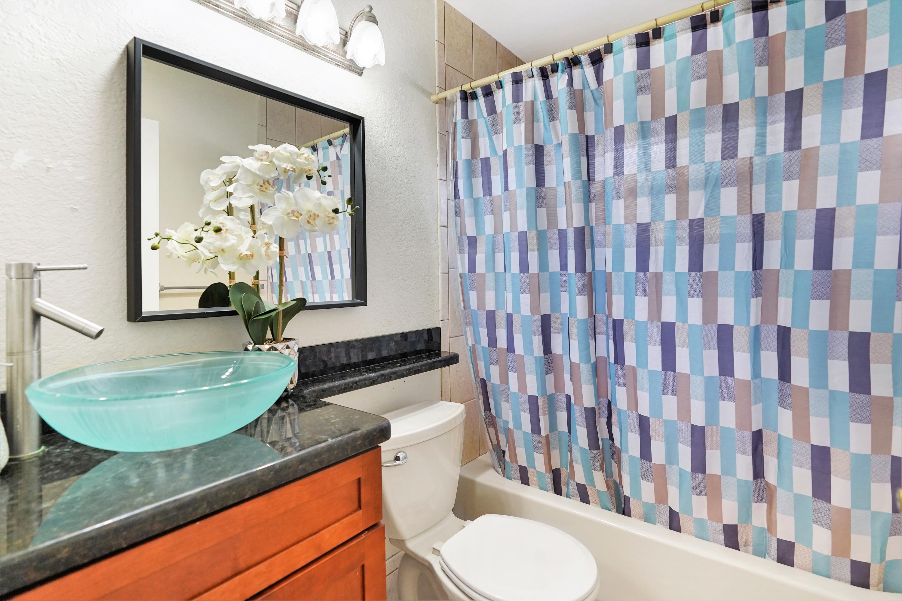 14001 Oak Ridge Drive Davie, FL 33325 - Photo 35 of 41 a bathroom with a granite countertop sink and a mirror