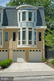a view of a pathway of house with yard