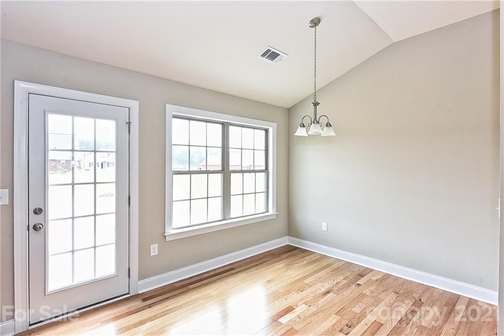 3324 Sincerity Road, Unit 6 Monroe, NC 28110 - Photo 16 of 29 a view of an empty room with a window