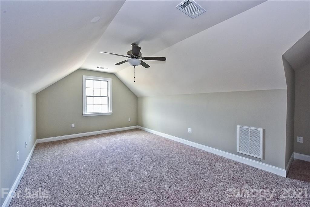 3324 Sincerity Road, Unit 6 Monroe, NC 28110 - Photo 26 of 29 a view of an empty room with a window