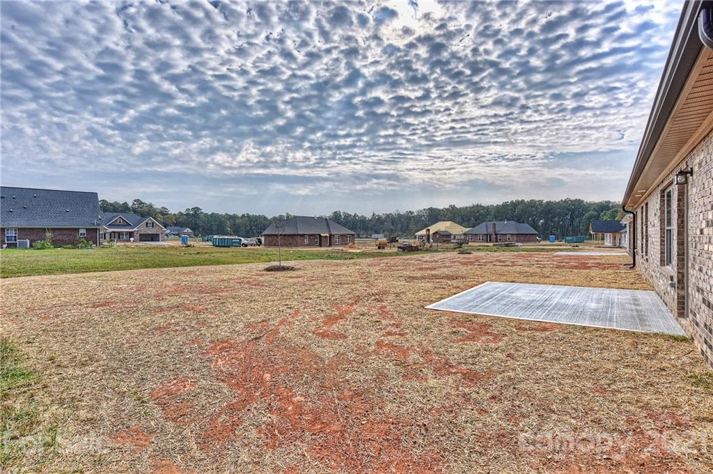 3324 Sincerity Road, Unit 6 Monroe, NC 28110 - Photo 28 of 29 a view of a lake with houses