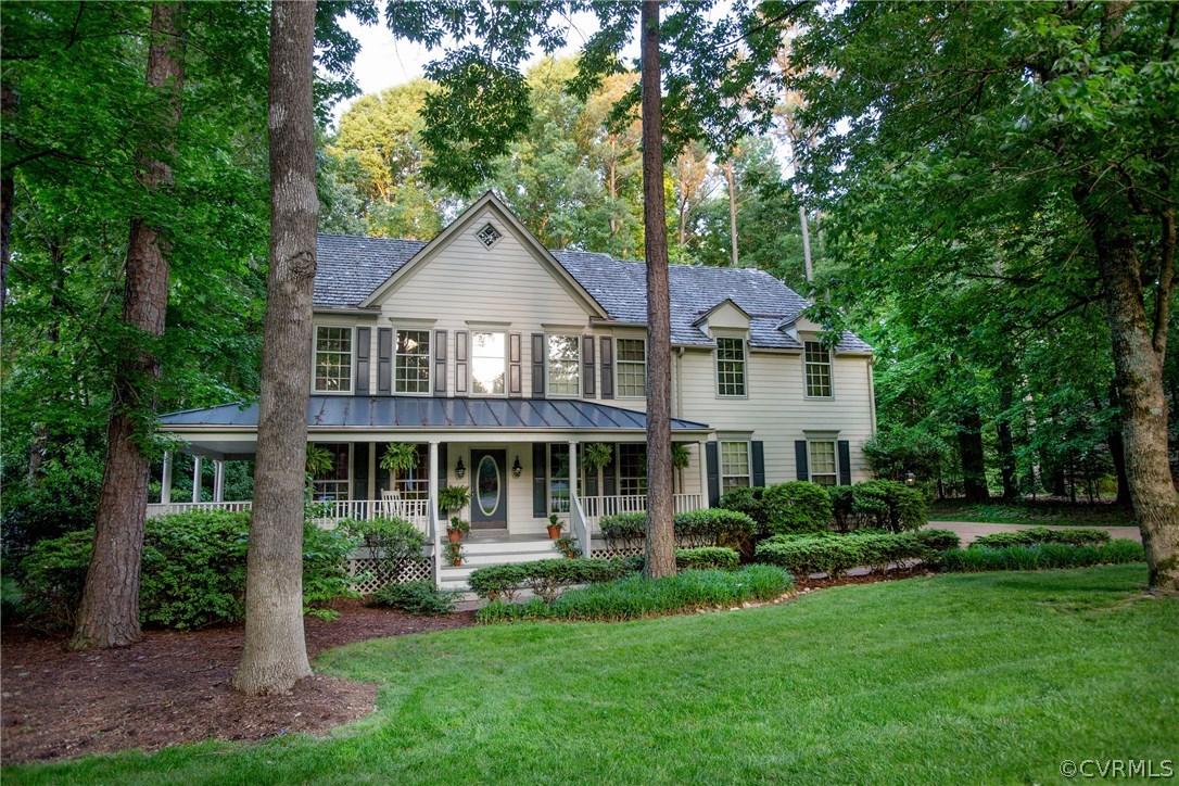 4401 Uppingham Road Richmond, VA 23235 - Photo 1 of 23 a front view of a house with a yard and green space