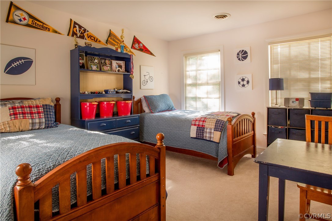 4401 Uppingham Road Richmond, VA 23235 - Photo 14 of 23 a bedroom with furniture and a window