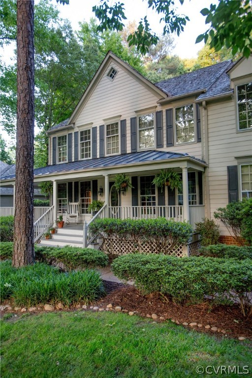 4401 Uppingham Road Richmond, VA 23235 - Photo 19 of 23 a front view of a house with a garden
