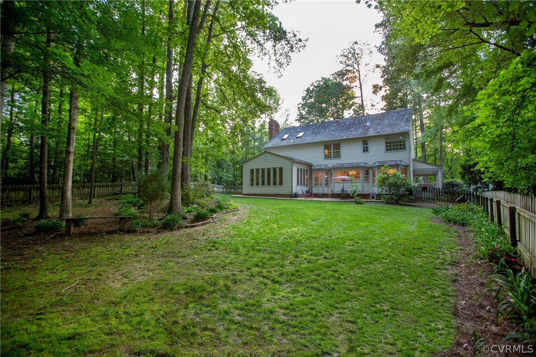 4401 Uppingham Road Richmond, VA 23235 - Photo 21 of 23 a view of a house with backyard and garden