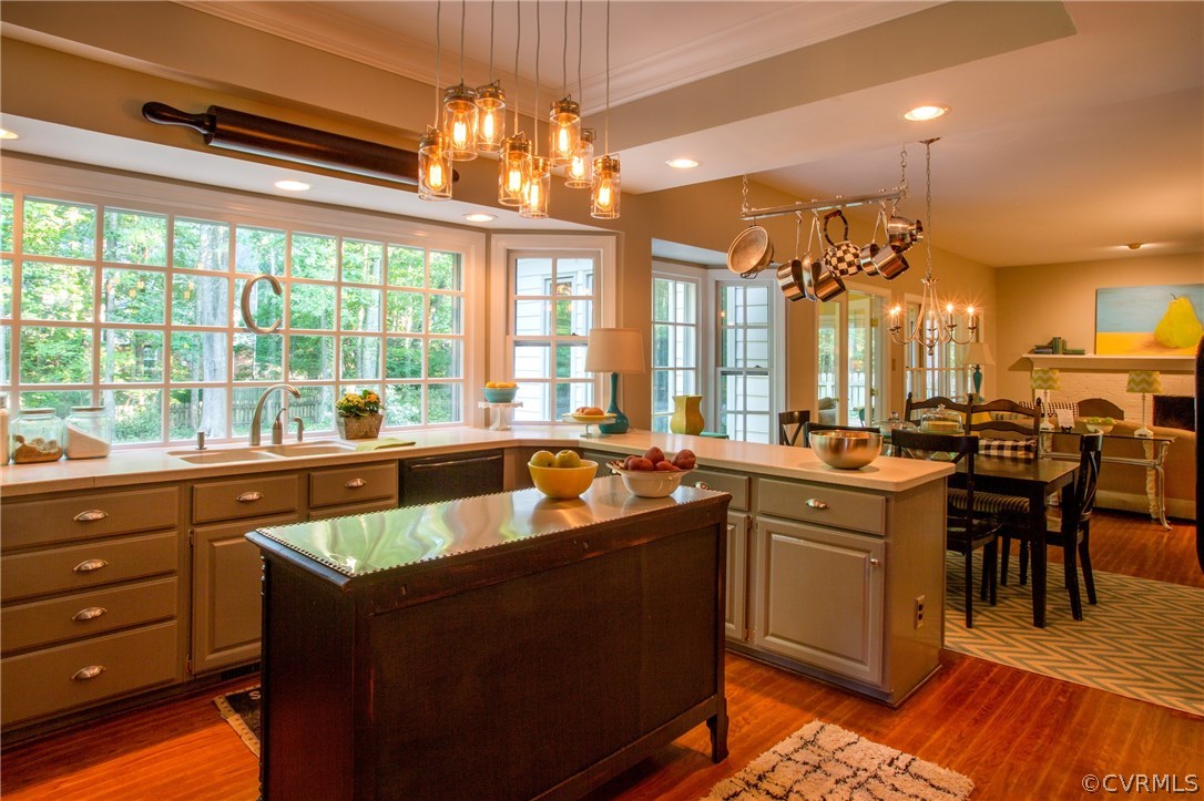 4401 Uppingham Road Richmond, VA 23235 - Photo 8 of 23 a large kitchen with a large window and chairs