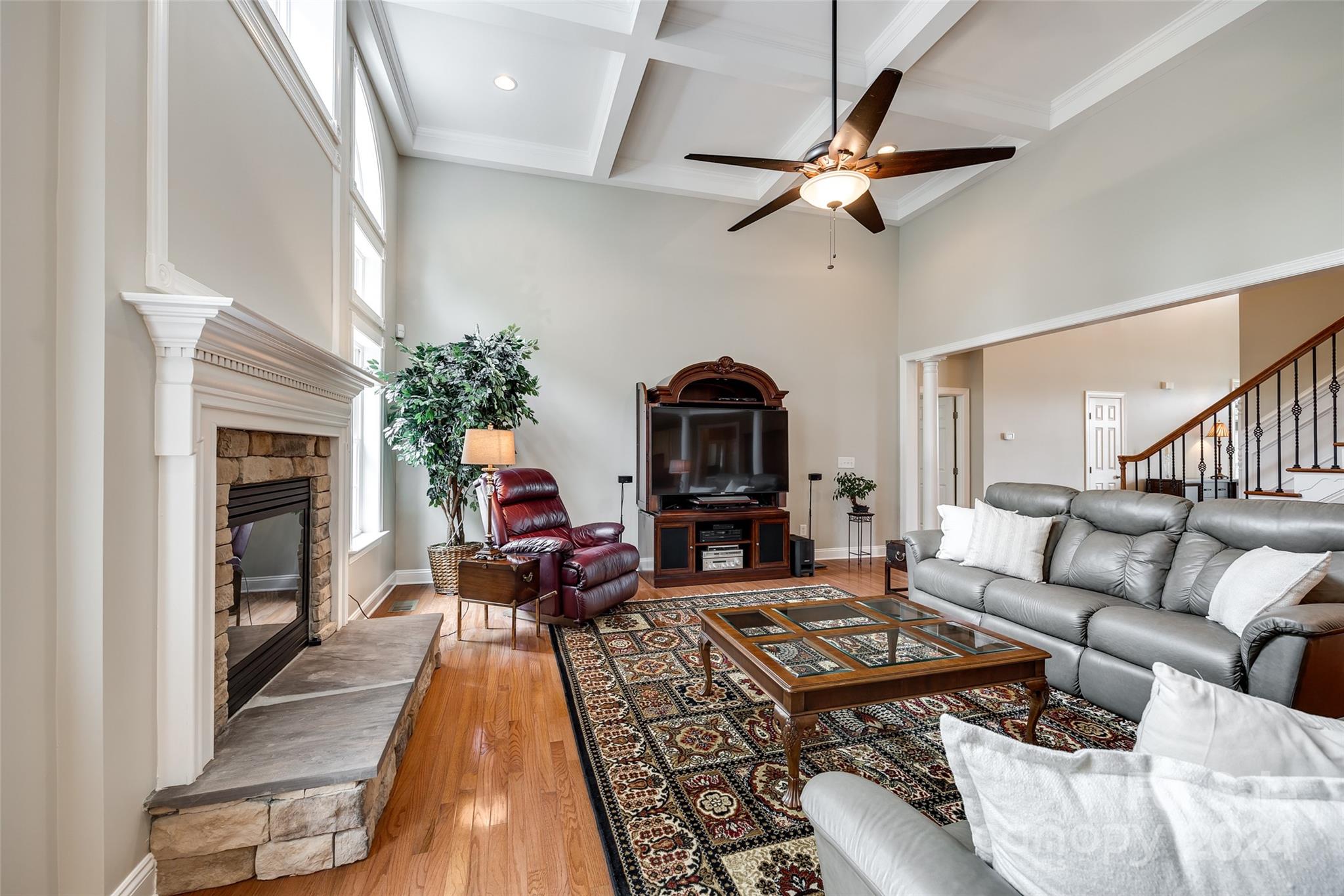 352 Calming Way Tega Cay, SC 29708 - Photo 13 of 48 a living room with furniture and a fireplace