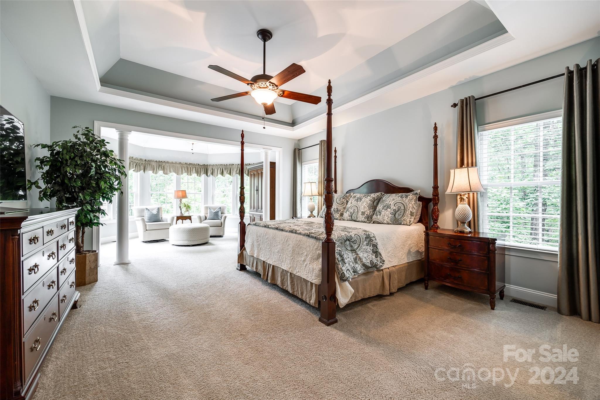 352 Calming Way Tega Cay, SC 29708 - Photo 21 of 48 a spacious bedroom with a bed and a window