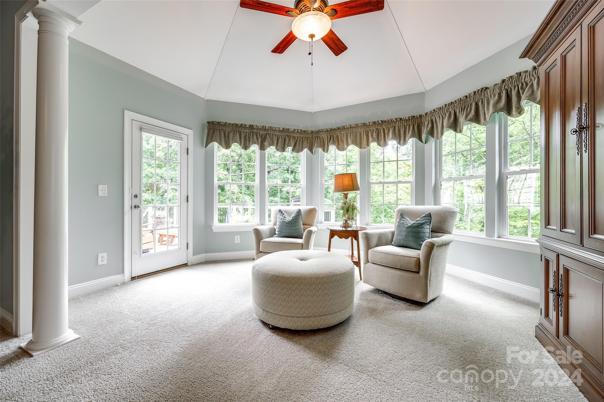 352 Calming Way Tega Cay, SC 29708 - Photo 23 of 48 a living room with furniture and a large window