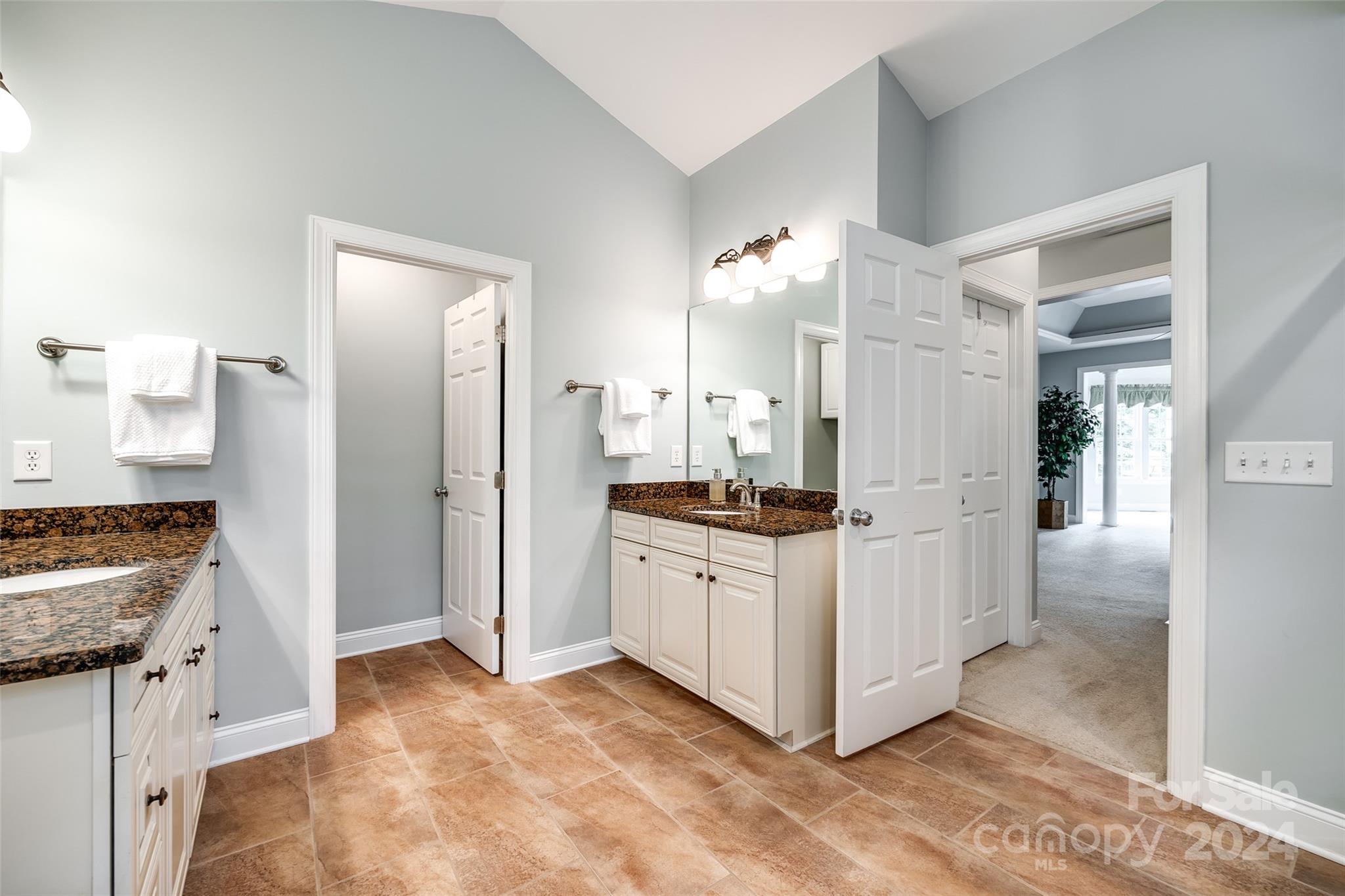 352 Calming Way Tega Cay, SC 29708 - Photo 26 of 48 a kitchen with stainless steel appliances granite countertop a refrigerator and a sink