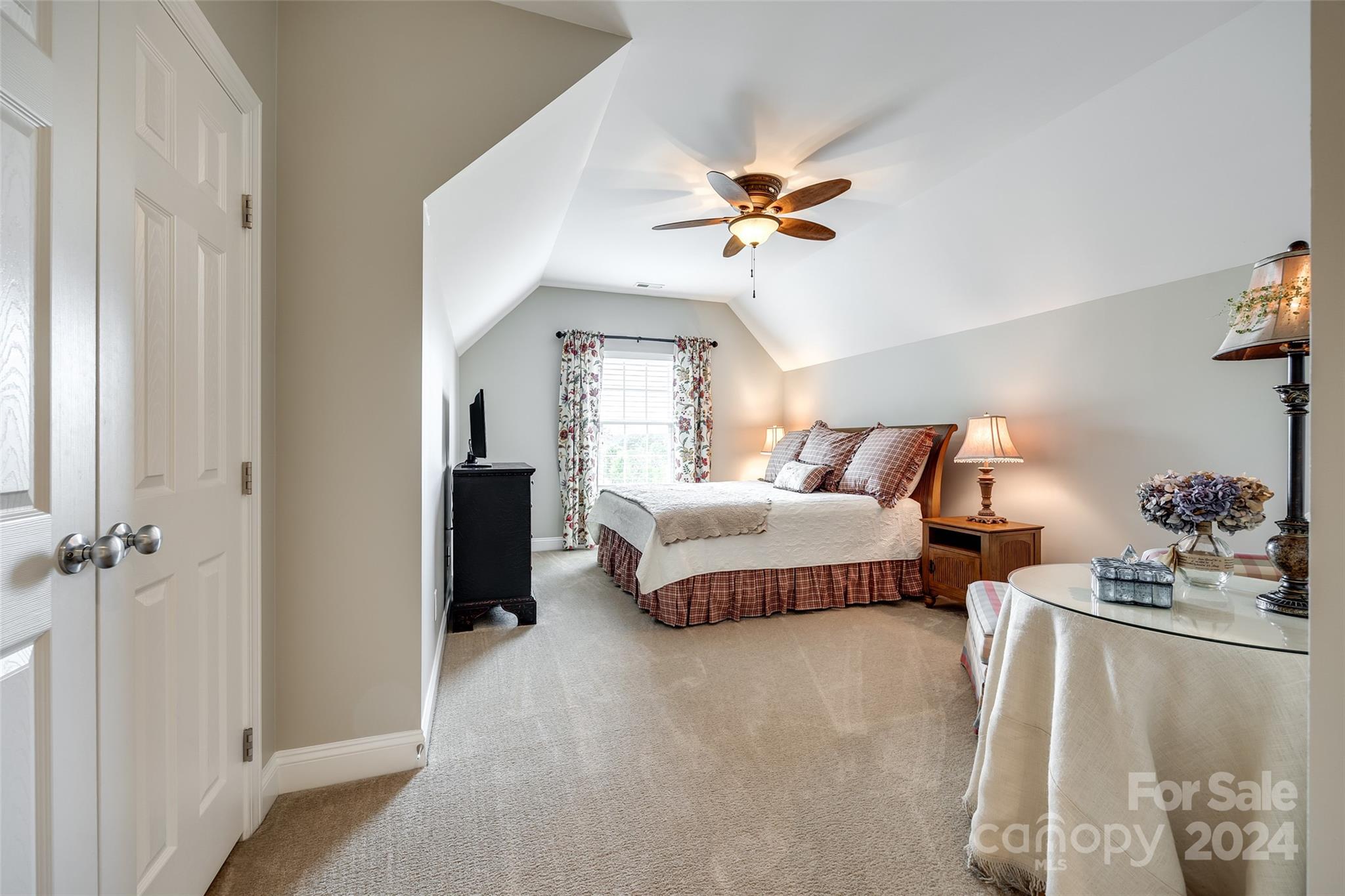 352 Calming Way Tega Cay, SC 29708 - Photo 32 of 48 a bedroom with bed and window