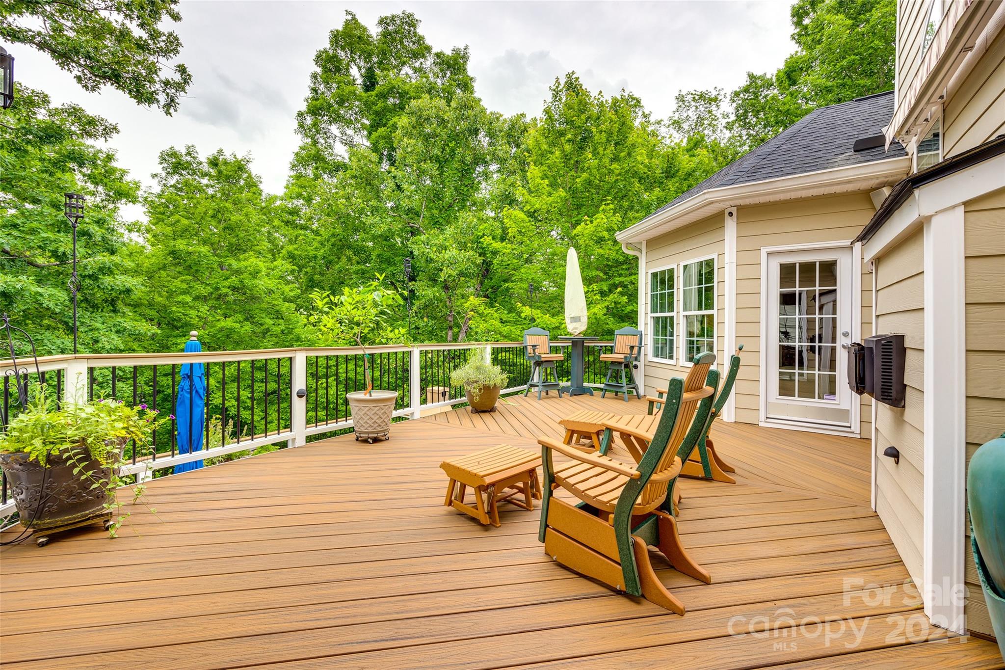352 Calming Way Tega Cay, SC 29708 - Photo 36 of 48 a view of a chairs on wooden deck