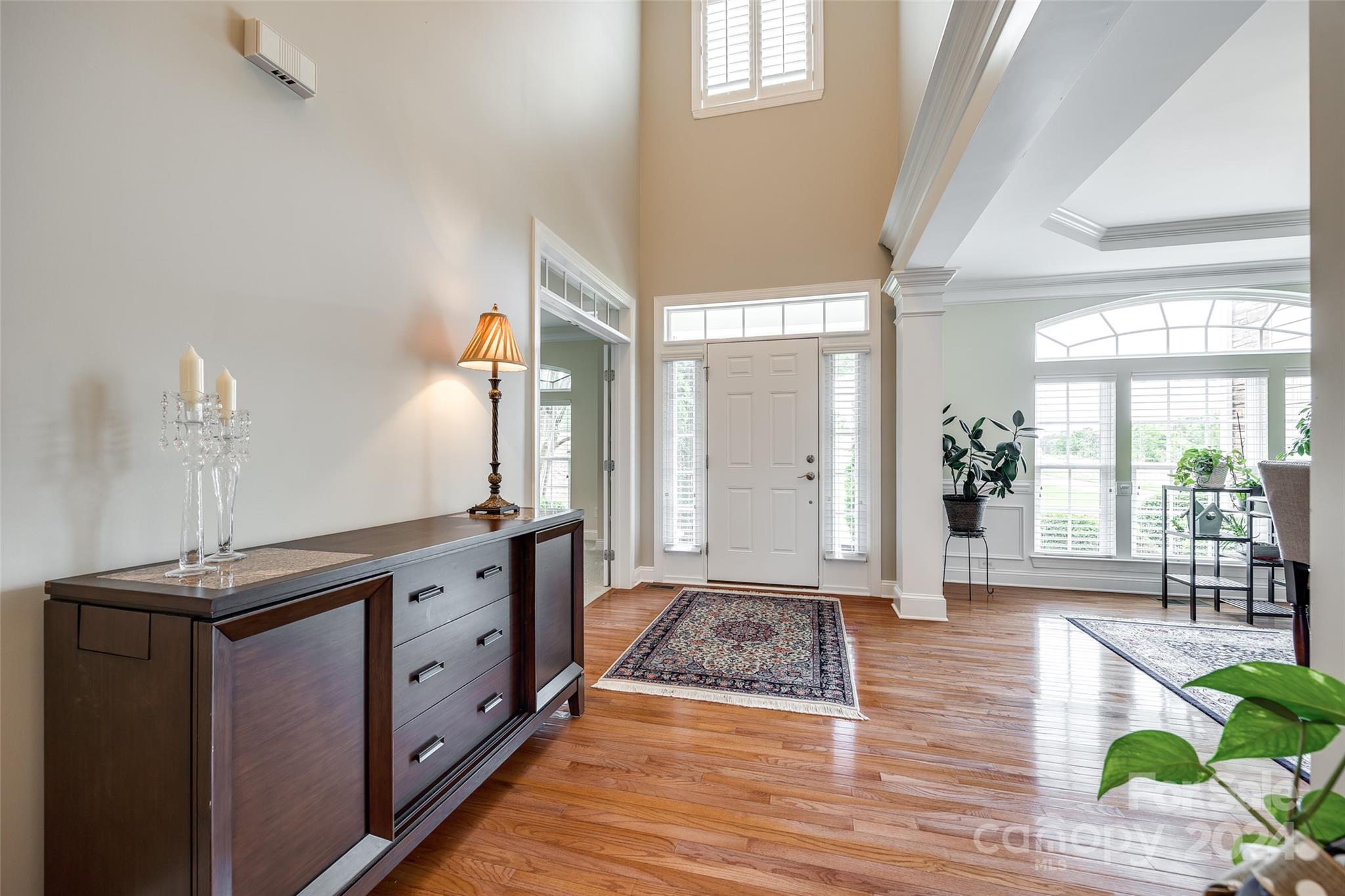 352 Calming Way Tega Cay, SC 29708 - Photo 4 of 48 a spacious bathroom with a double vanity sink and a mirror