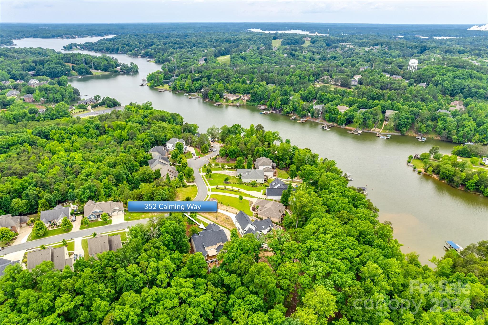 352 Calming Way Tega Cay, SC 29708 - Photo 48 of 48 an aerial view of residential houses with outdoor space and lake view