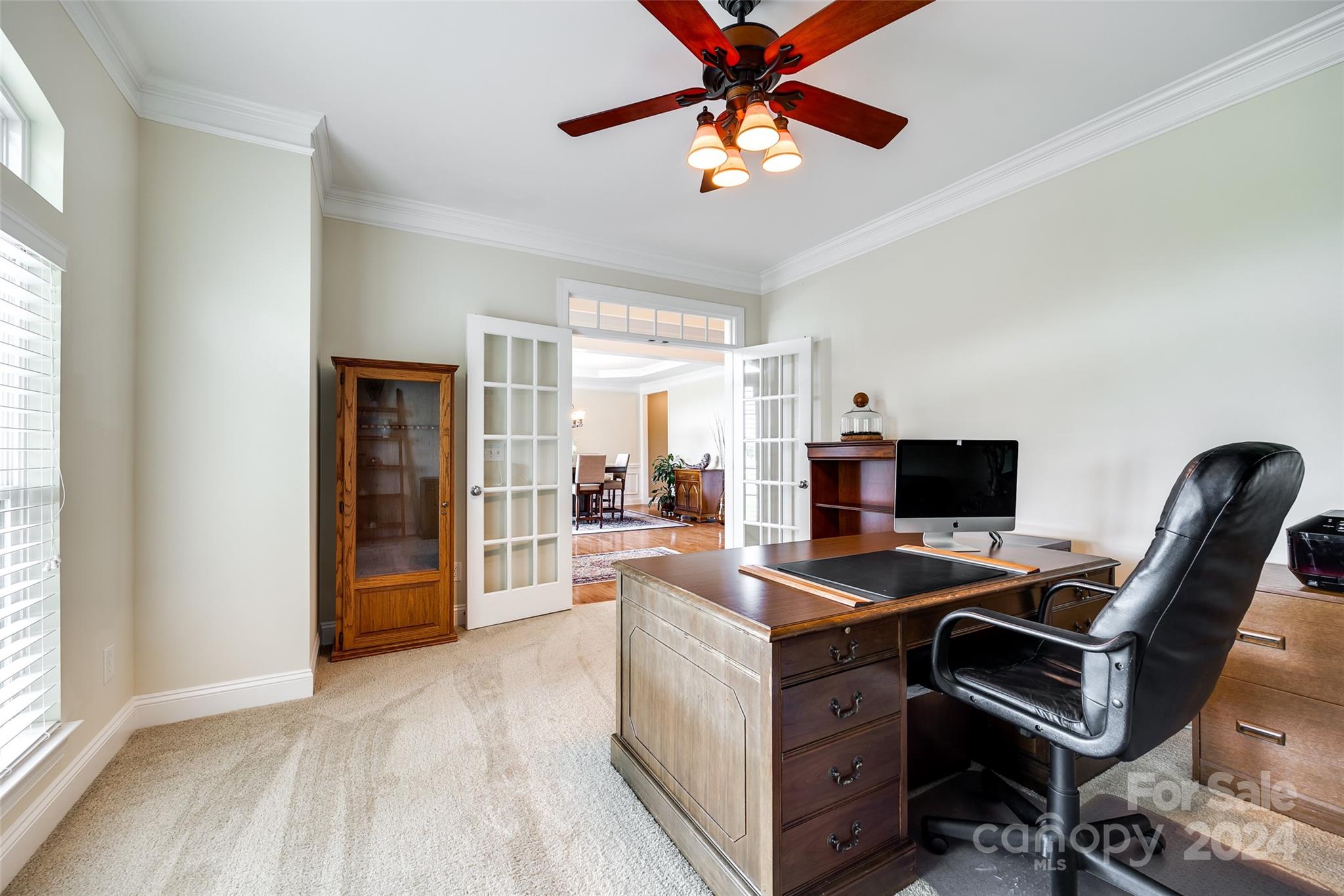 352 Calming Way Tega Cay, SC 29708 - Photo 7 of 48 a view of a workspace with furniture and a window