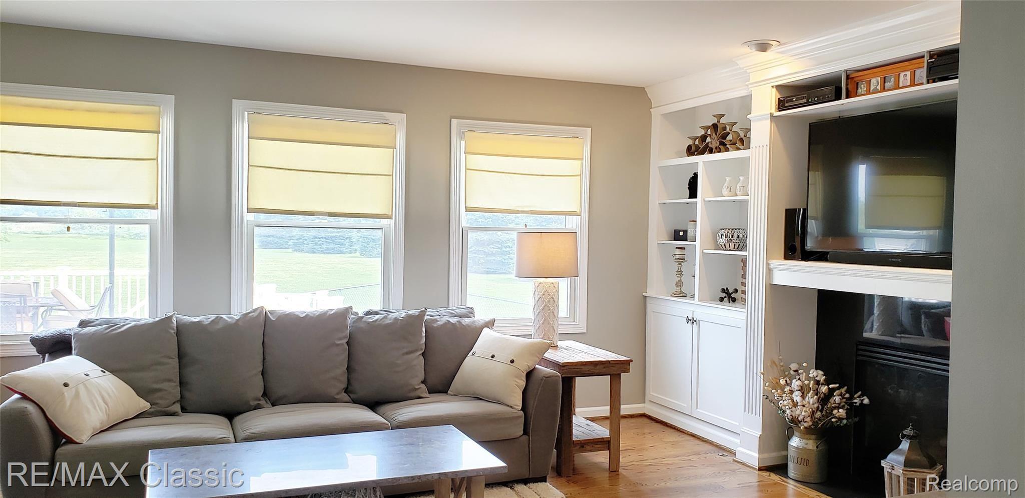 8070 Oak Grove Road Howell, MI 48855 - Photo 16 of 34 Living room with recessed lighting & lots of natural light.
