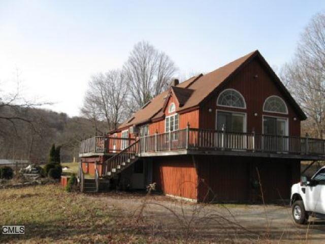 112 Laurel Hill Road Brookfield, CT 06804 - Photo 1 of 1 a front view of a house with a yard