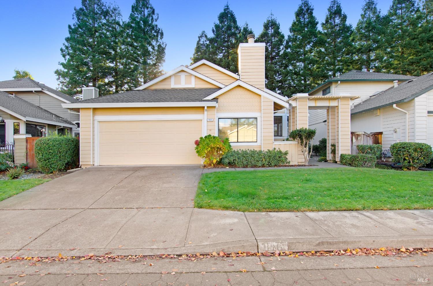 168 South Temelec Circle Sonoma, CA 95476 - Photo 1 of 1 a front view of a house with a yard and garage