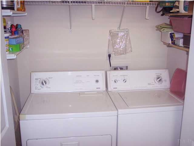 1098 Brownfield Road Pensacola, FL 32526 - Photo 13 of 16 Laundry closet with additional shelves. Washer/dryer stay w/ new homeowner.