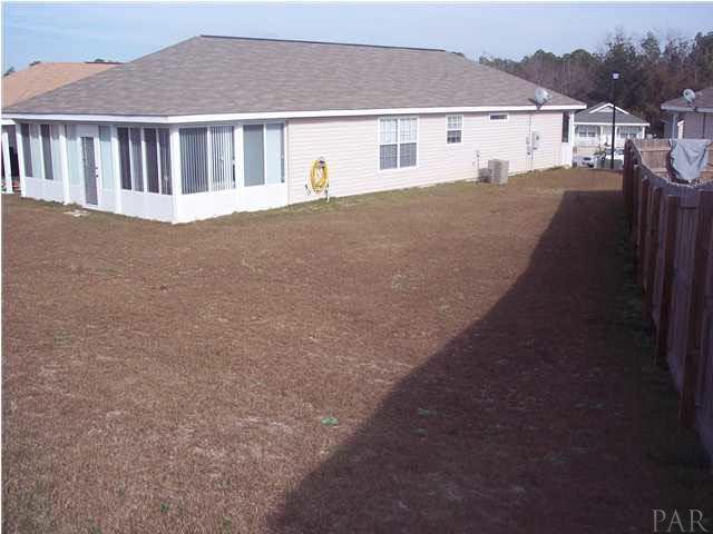 1098 Brownfield Road Pensacola, FL 32526 - Photo 15 of 16 View of back yard from Southwest corner. .17 acre premium lot.