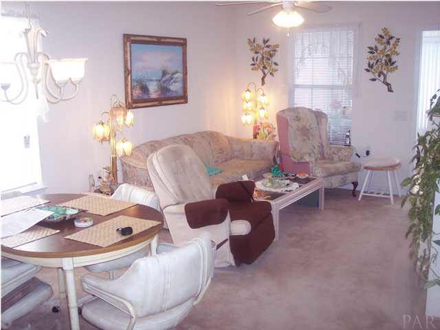 1098 Brownfield Road Pensacola, FL 32526 - Photo 3 of 16 View of family room with window to enclosed Florida room.