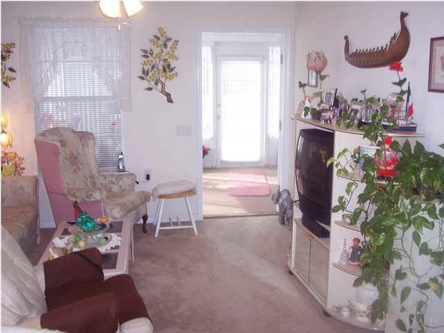 1098 Brownfield Road Pensacola, FL 32526 - Photo 4 of 16 Family room view from dining area. French door leads to 12x24 enclosed Florida room.