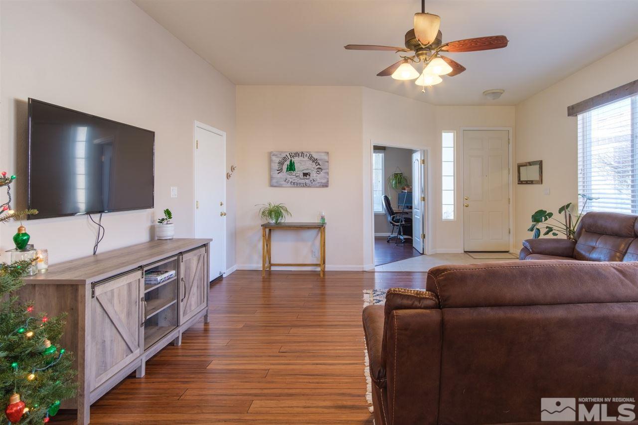 2220 Hampton Park Court Reno, NV 89521 - Photo 3 of 22 a living room with furniture and a flat screen tv