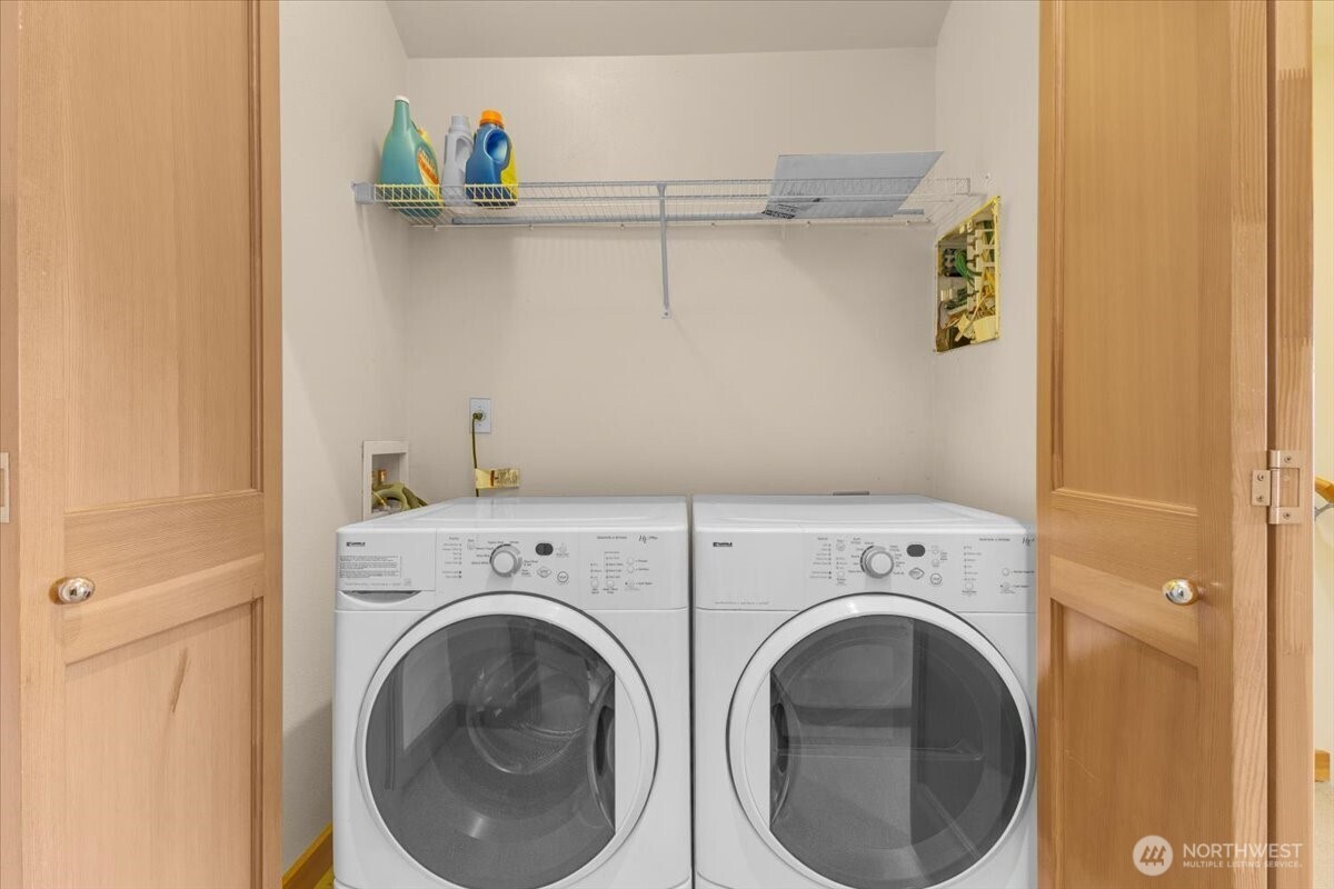 1719 Southwest Henderson Street Seattle, WA 98106 - Photo 18 of 22 a utility room with dryer and washer