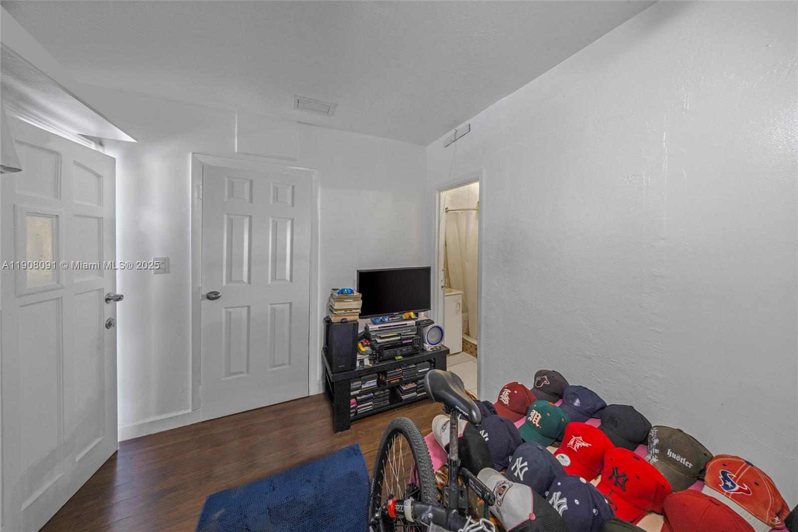 1334 Southwest 4th Street Miami, FL 33135 - Photo 18 of 46 a view of a workspace with furniture and a window