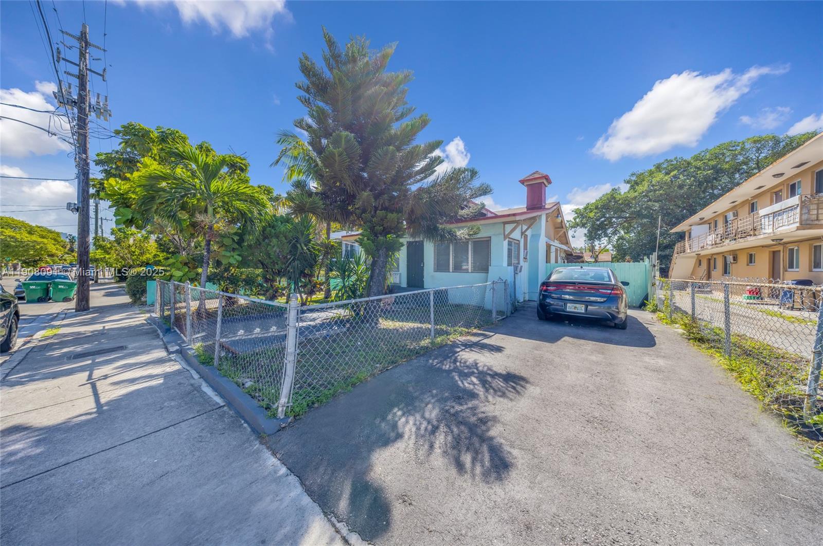 1334 Southwest 4th Street Miami, FL 33135 - Photo 2 of 46 a view of a house with a yard