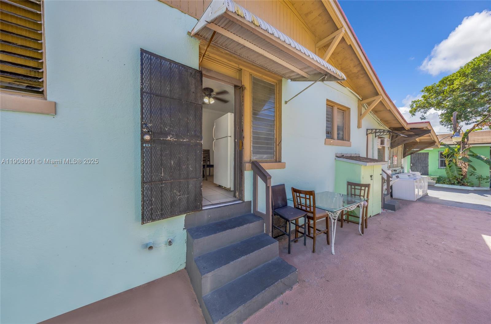 1334 Southwest 4th Street Miami, FL 33135 - Photo 38 of 46 a view of a house with backyard and sitting area