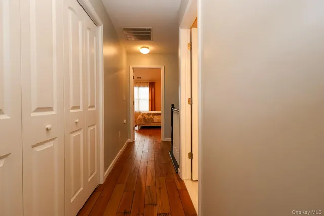 a view of a bathroom from the hallway