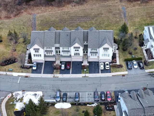 a view of a house with patio outdoor seating