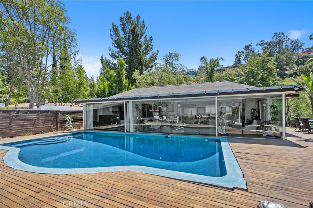 7241 Woodrow Wilson Drive Los Angeles, CA 90068 - Photo 2 of 43 a view of a house with pool and sitting area