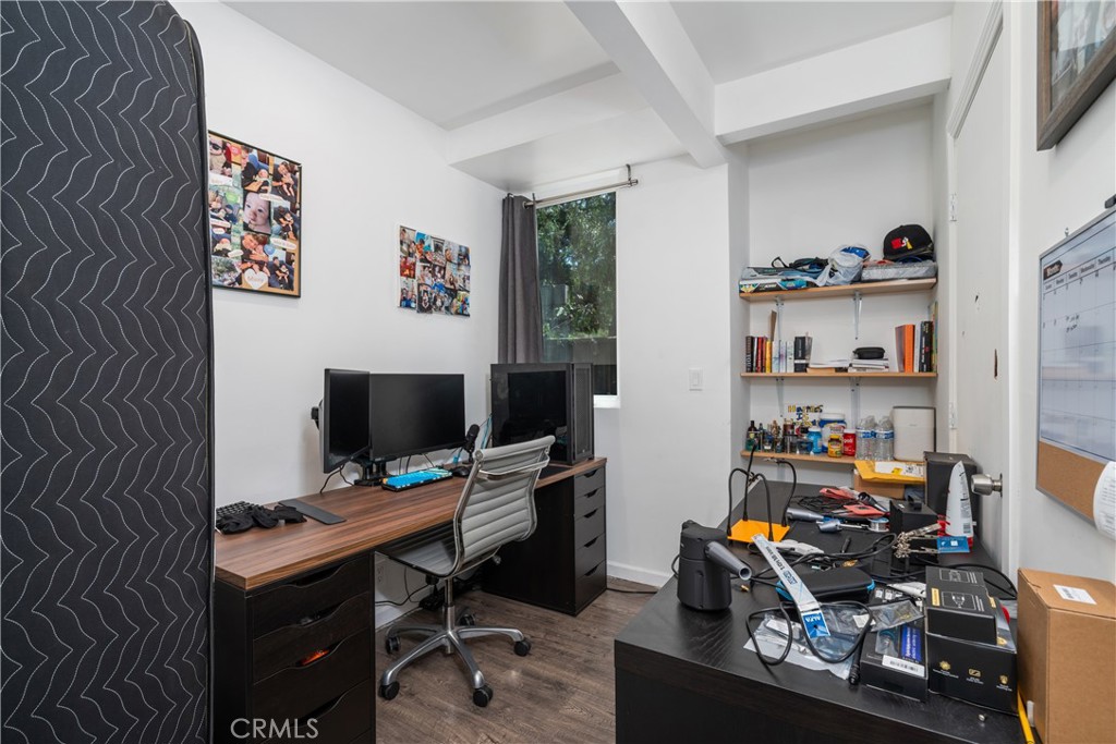7241 Woodrow Wilson Drive Los Angeles, CA 90068 - Photo 22 of 43 a view of a workspace with furniture and toys