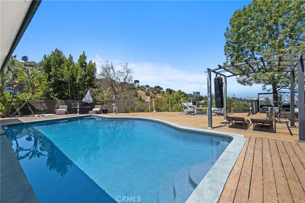 7241 Woodrow Wilson Drive Los Angeles, CA 90068 - Photo 29 of 43 a view of a balcony with chairs