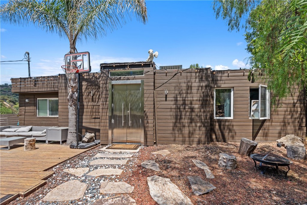 7241 Woodrow Wilson Drive Los Angeles, CA 90068 - Photo 33 of 43 a view of a brick house with many windows