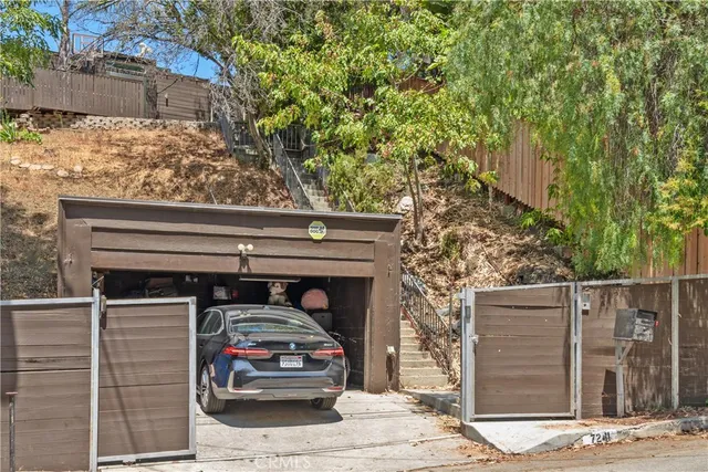 a car parked in front of a house