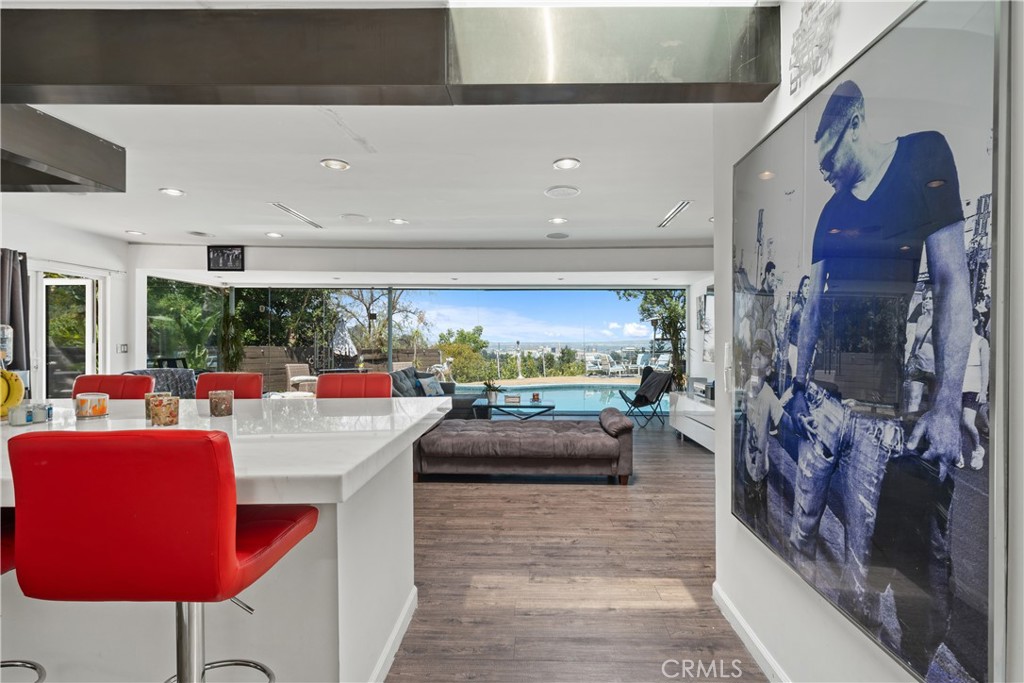 7241 Woodrow Wilson Drive Los Angeles, CA 90068 - Photo 6 of 43 a view of a living room and dining area