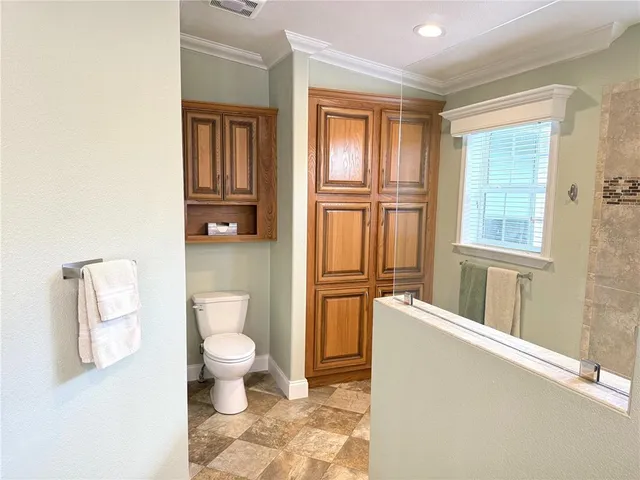 a bathroom with a toilet
