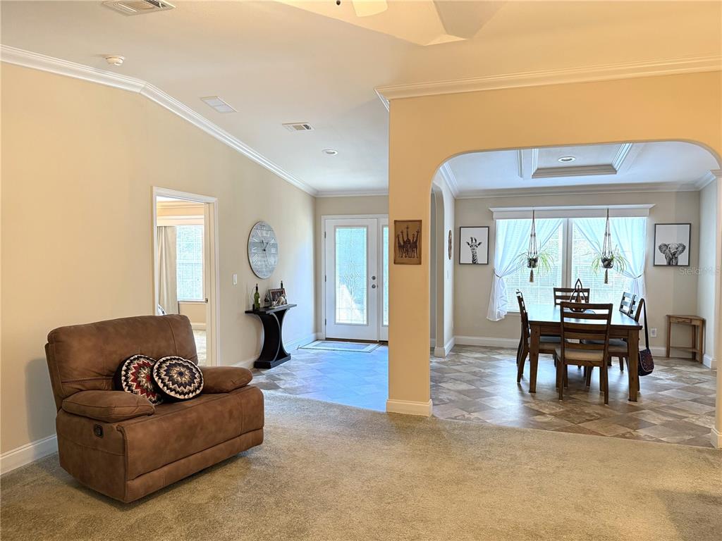 8261 Northeast 118 Terrace Bronson, FL 32621 - Photo 2 of 43 a living room with furniture