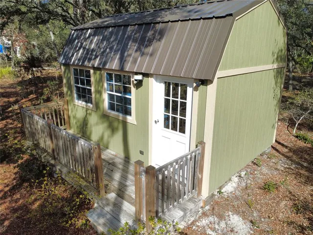 front view of a house with a small yard