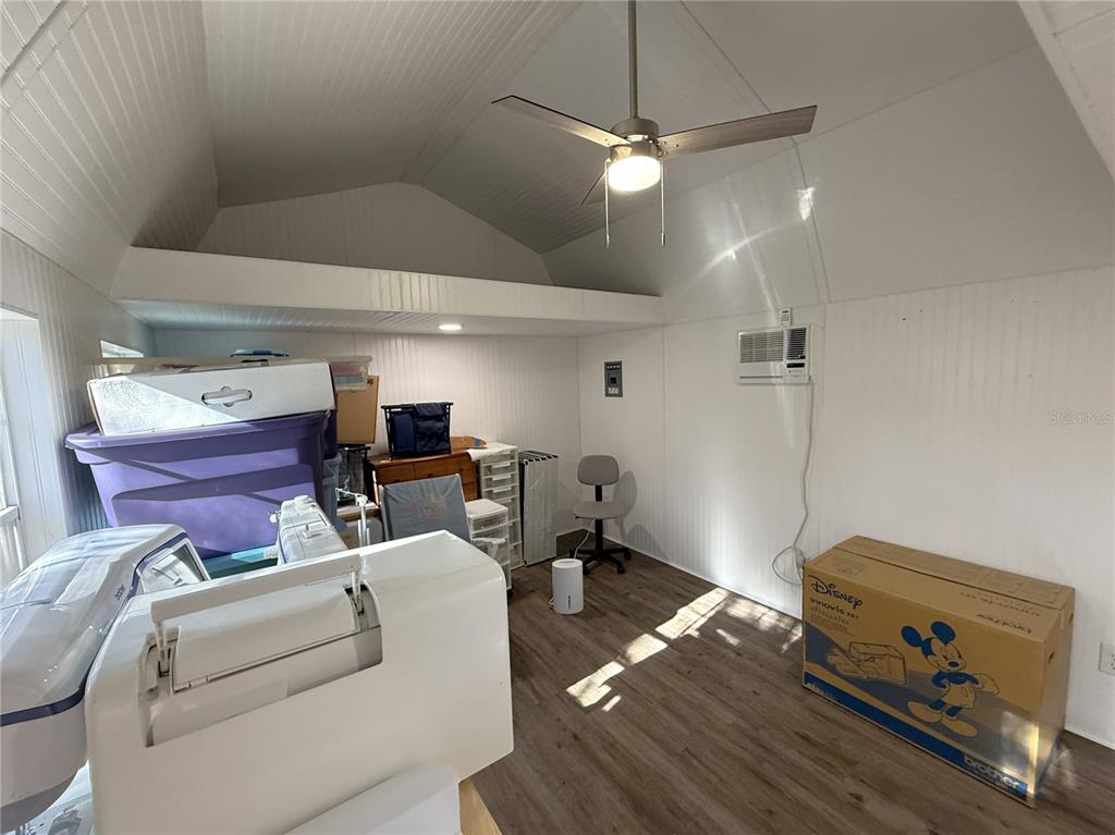 8261 Northeast 118 Terrace Bronson, FL 32621 - Photo 28 of 43 a living room with furniture and a flat screen tv