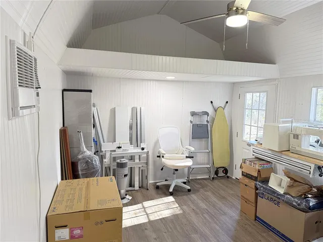 a front view of a house with a large windows