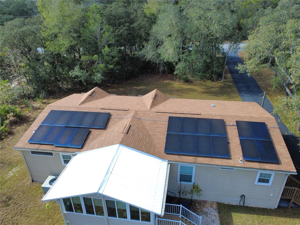 8261 Northeast 118 Terrace Bronson, FL 32621 - Photo 33 of 43 a view of a balcony with chairs