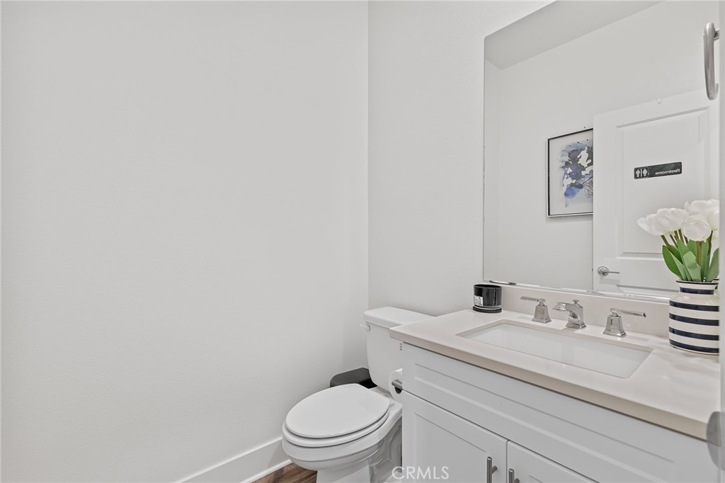 8691 Innovation Street Chino, CA 91708 - Photo 19 of 67 Half bathroom for guests